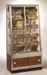 Self Serve Cigar Wallcase with framed, easy sliding storage doors.