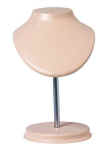 Small necklace display form stands 10 1/4 inches tall with wood base.